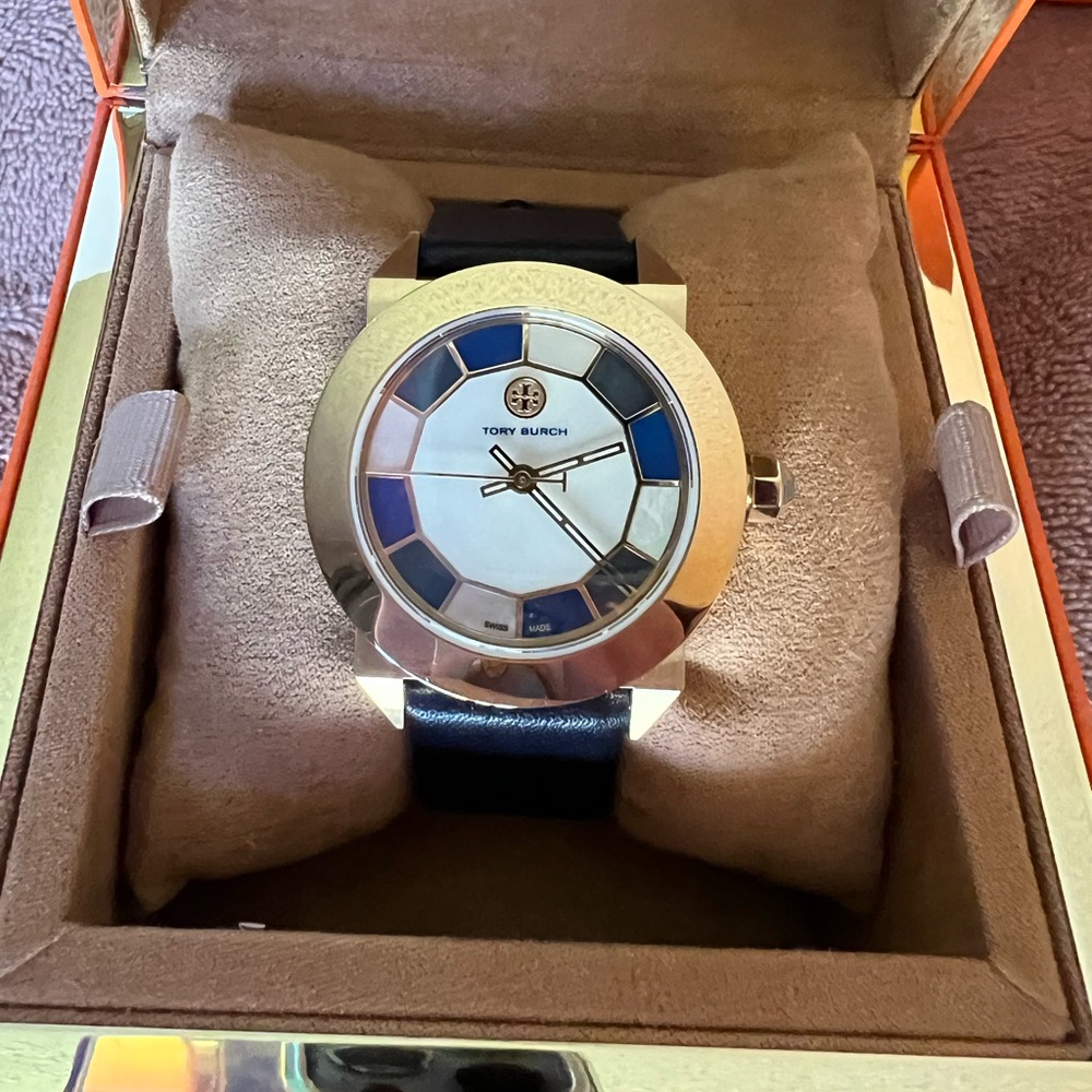 Brand new Tory Burch navy & mother of pearl watch.